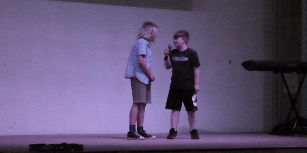 Curtis's Talent Show (Curtis is the taller kid on the left with long blonde hair)
