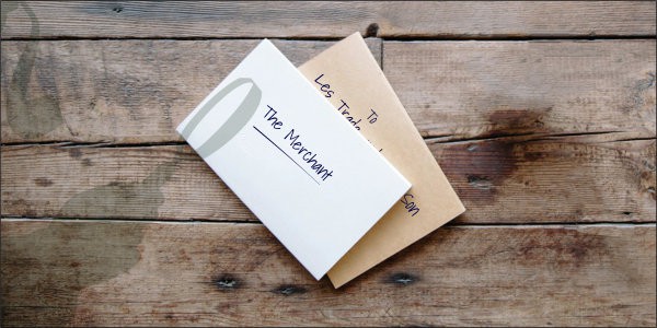 Envelope and note with The Merchant written on it