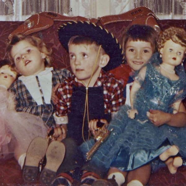 The Ghost Of Christmas Past The writer and his sisters with their Christmas gifts.