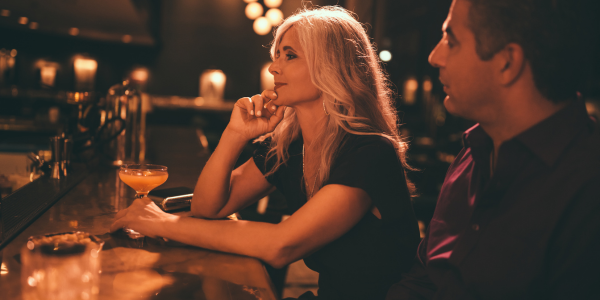 Man and woman sitting in a bar