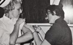 Mrs Hitz gets an injection from our classmate