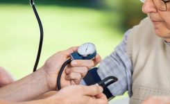 Nurse measuring blood pressure Nurse measuring blood pressure